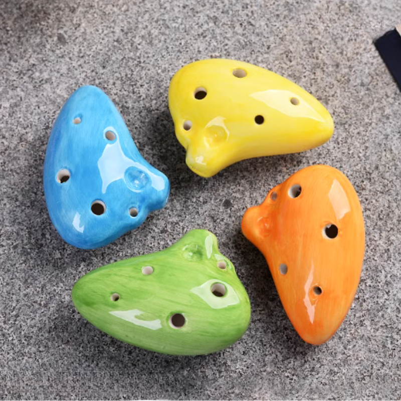 6-Hole Orange Ocarina Little Teeth Shape